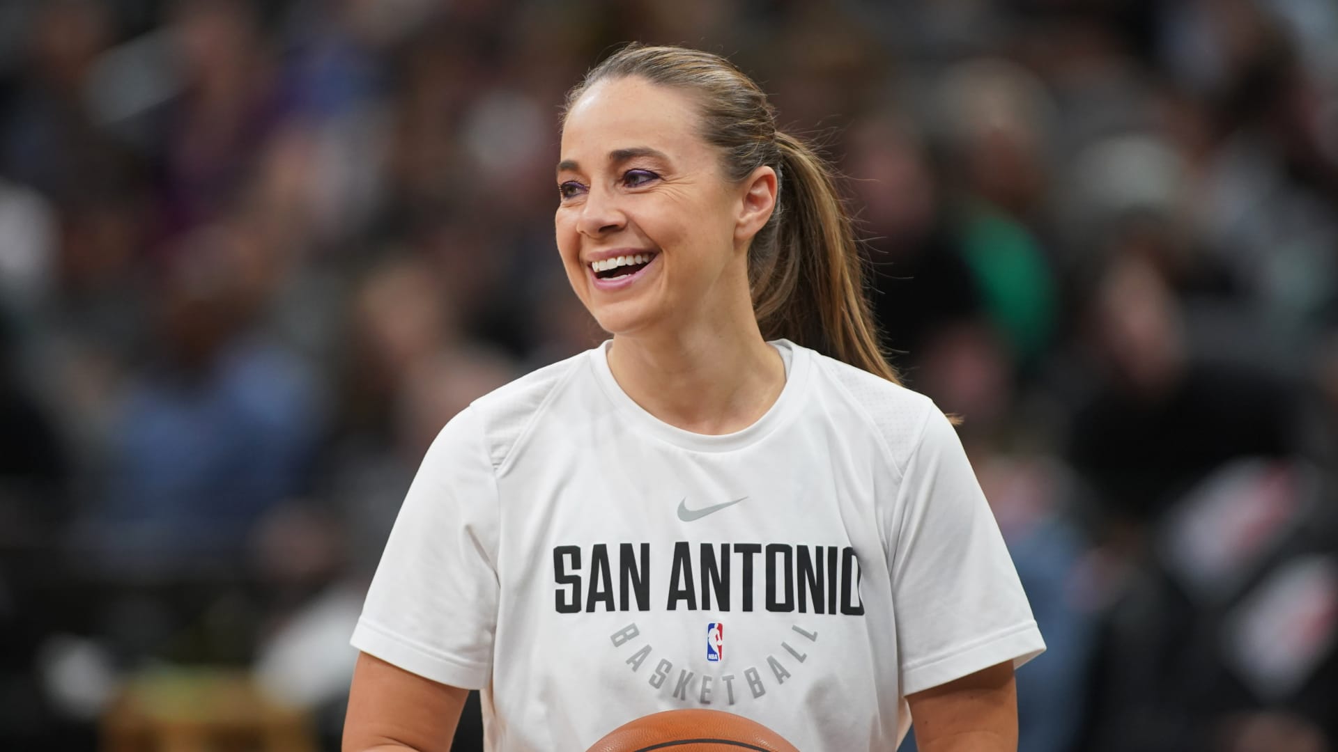 Assistant Coach Becky Hammond warms up with players before the game against the Oklahoma City Thunder on November 17, 2017 at the AT&T Center in San Antonio, Texas.