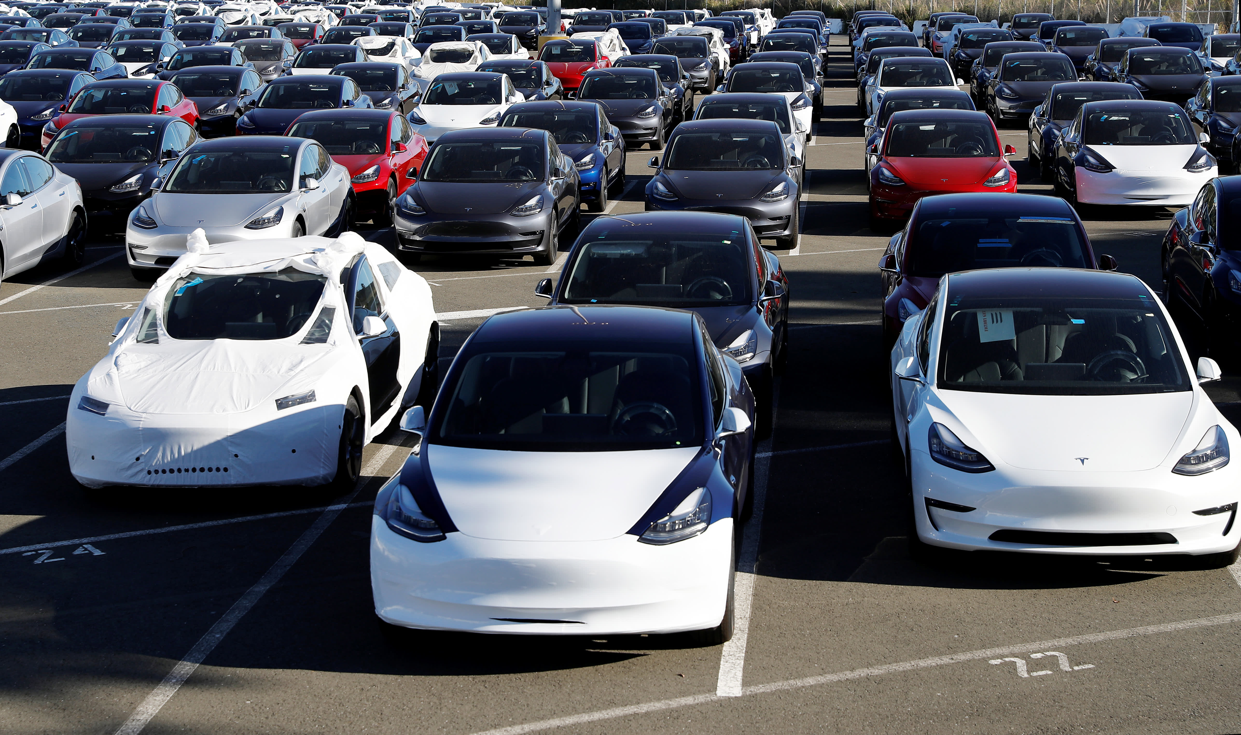 Tesla owns service centers: Pros and cons