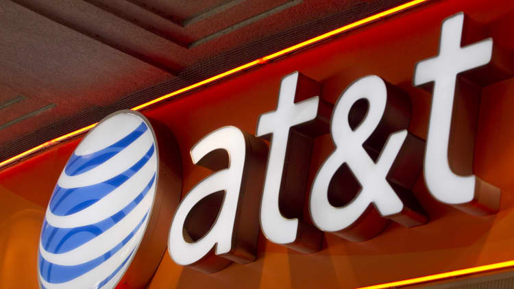 Investors flock into AT&T and Netflix shares
