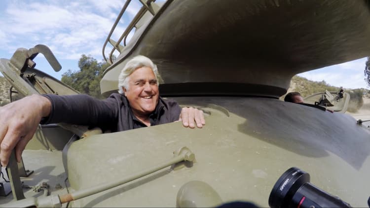 Jay Leno crushes a limo in a tank with Arnold Schwarzenegger