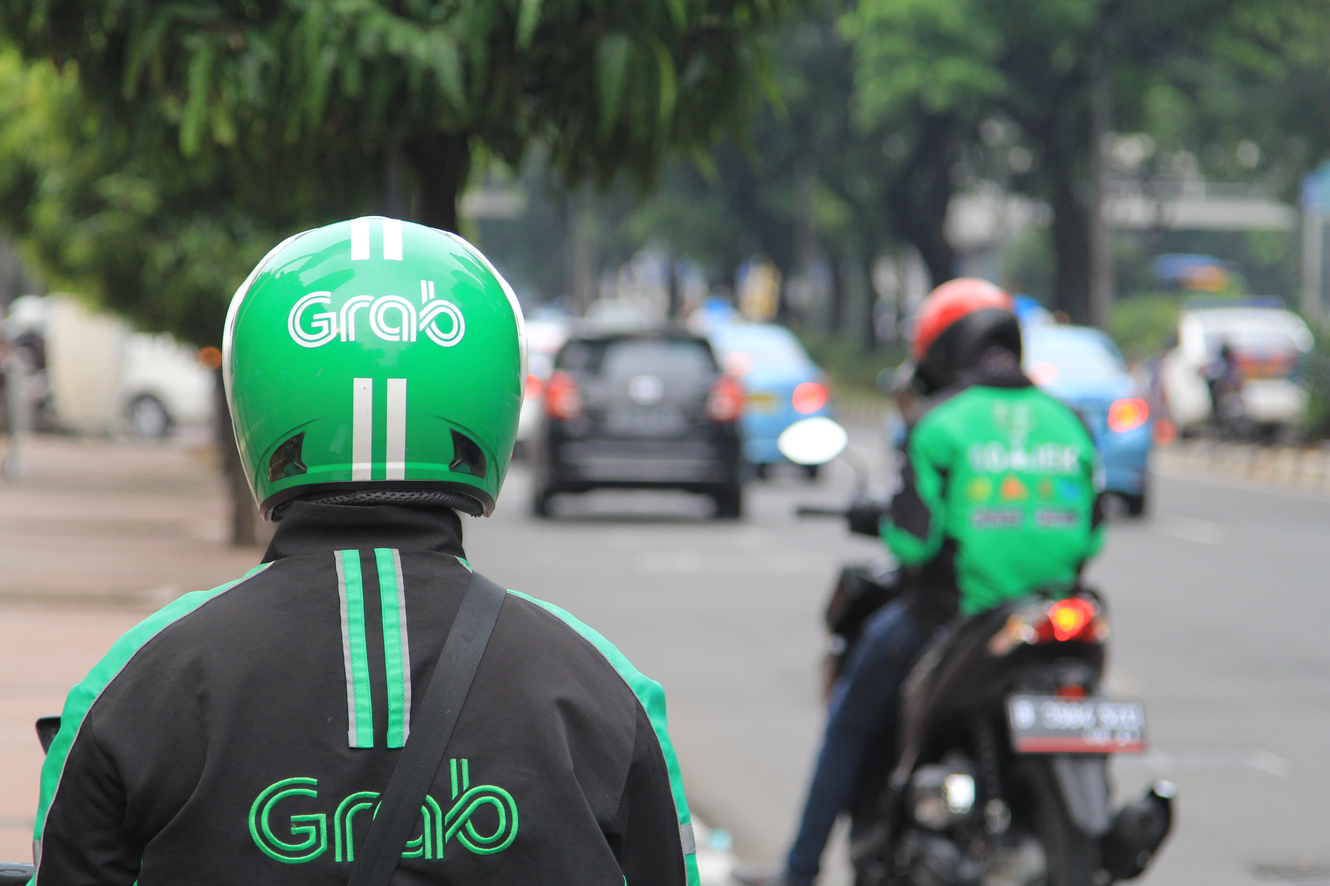 SoftBank-backed Grab tumbles after completing SPAC merger