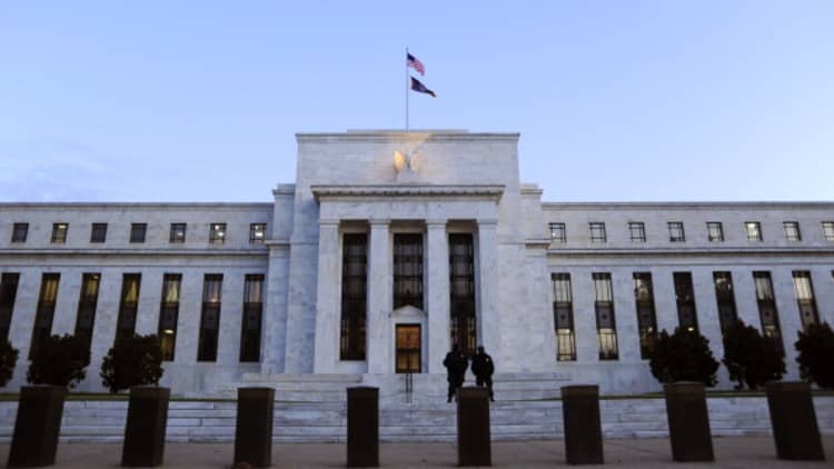 Treasury yields slip to bottom of recent range