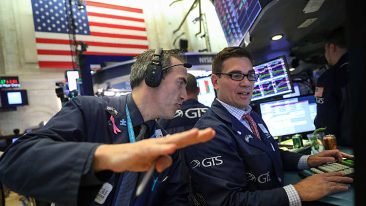 Stocks rise after strong earnings and economic data