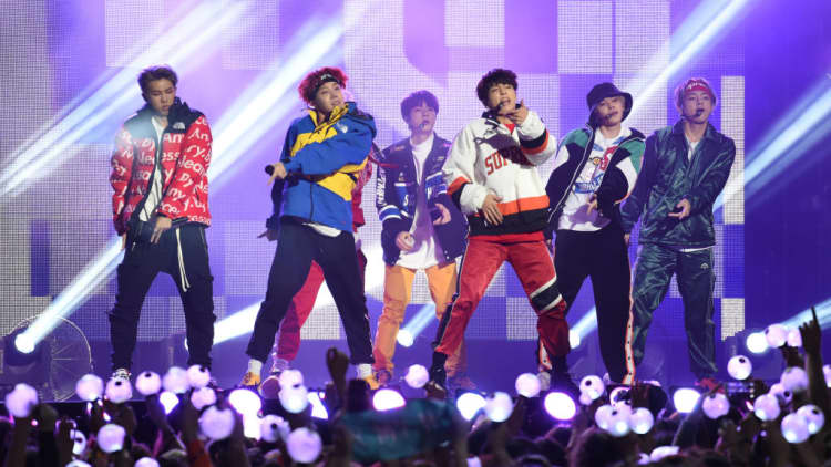 How K-pop band BTS generates billions of dollars for South Korea
