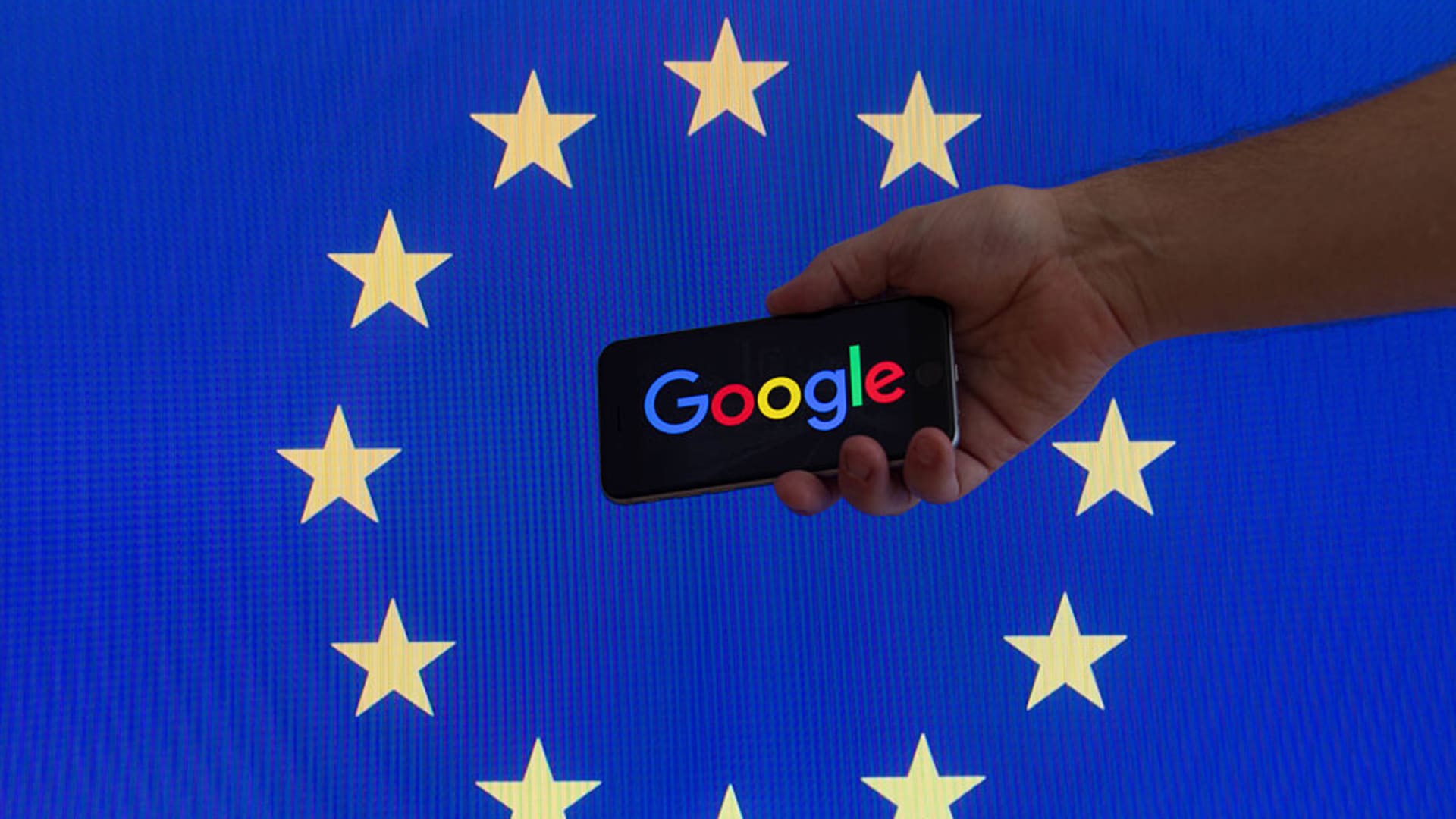 The European Union flag is seen with Google's logo.