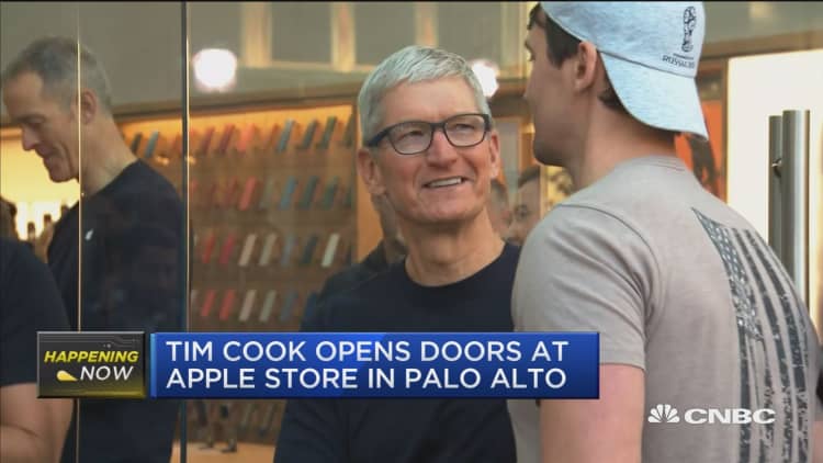 Tim Cook visits Apple Store as new iPhones go on sale