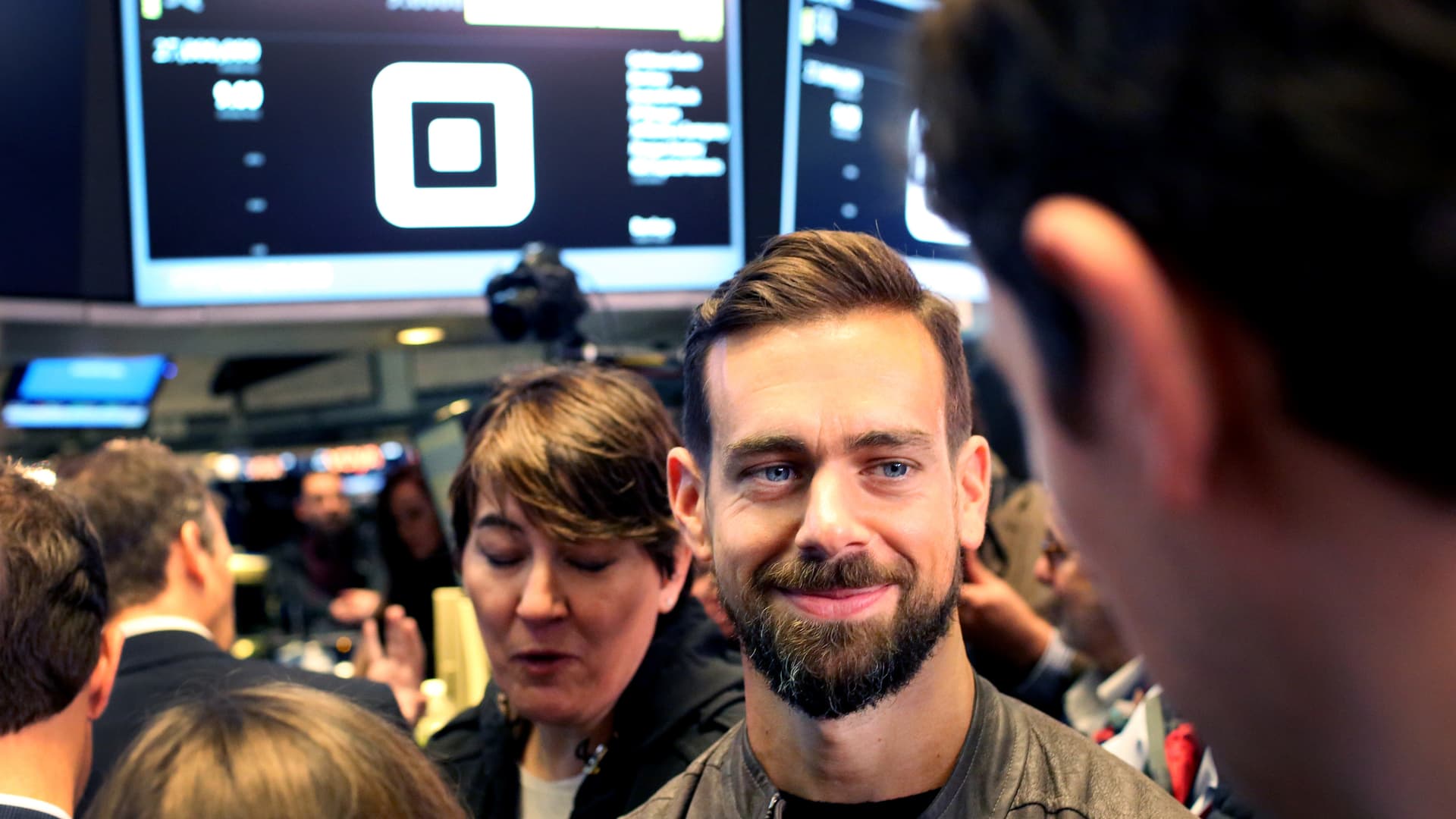 Jack Dorsey, chief executive officer of Square Inc., second right, tours the floor of the New York Stock Exchange (NYSE) in New York, U.S., on Thursday, Nov. 19, 2015.