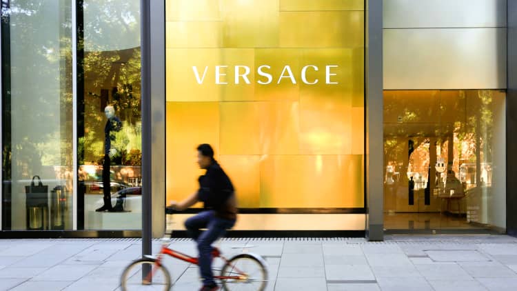 Versace is profitable, says Michael Kors CEO