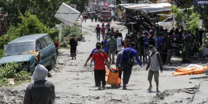 Indonesian leader steps up hunt for survivors as quake toll passes 1,200