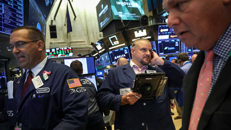 Dow closes at record high for 15th time this year