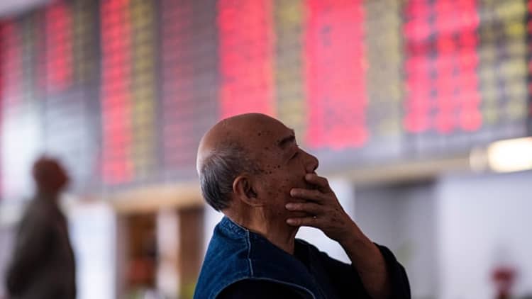 China officials pledge stock support