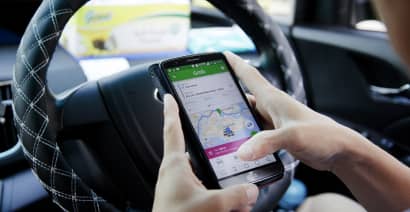Malaysia sovereign wealth fund on why it did not invest in ride-hailing app Grab 