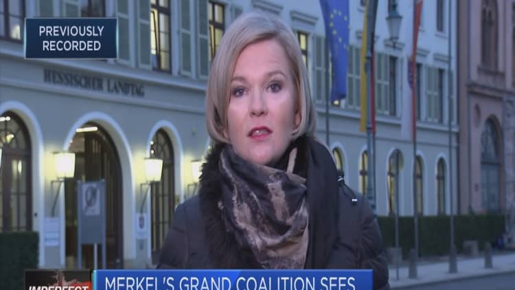 Merkel's grand coalition sees heavy losses in regional election