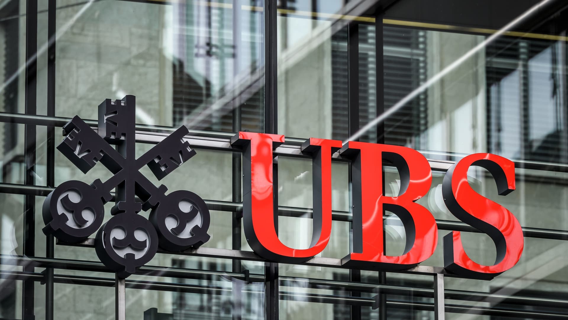 A sign of Swiss banking giant UBS is seen at a branch in Zurich on October 26, 2018.