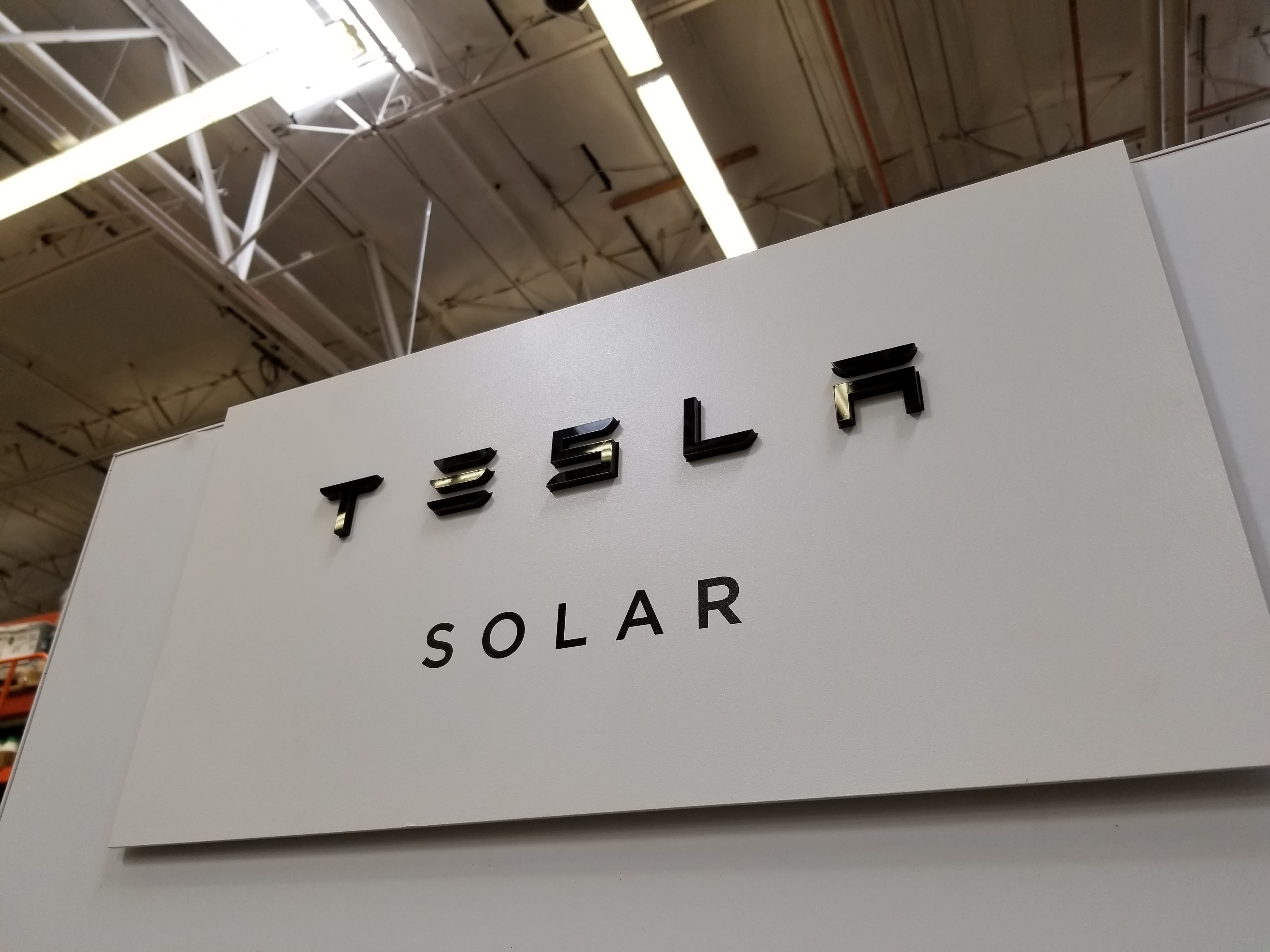 Tesla to reverse solar price hike for some customers, legal filing says