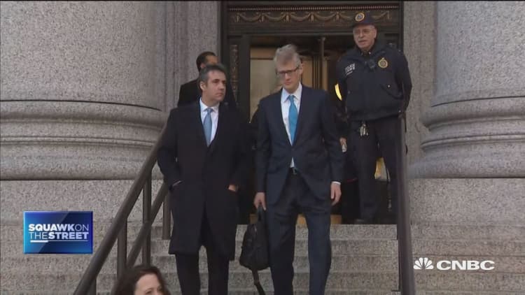 Michael Cohen walks out of court after pleading guilty