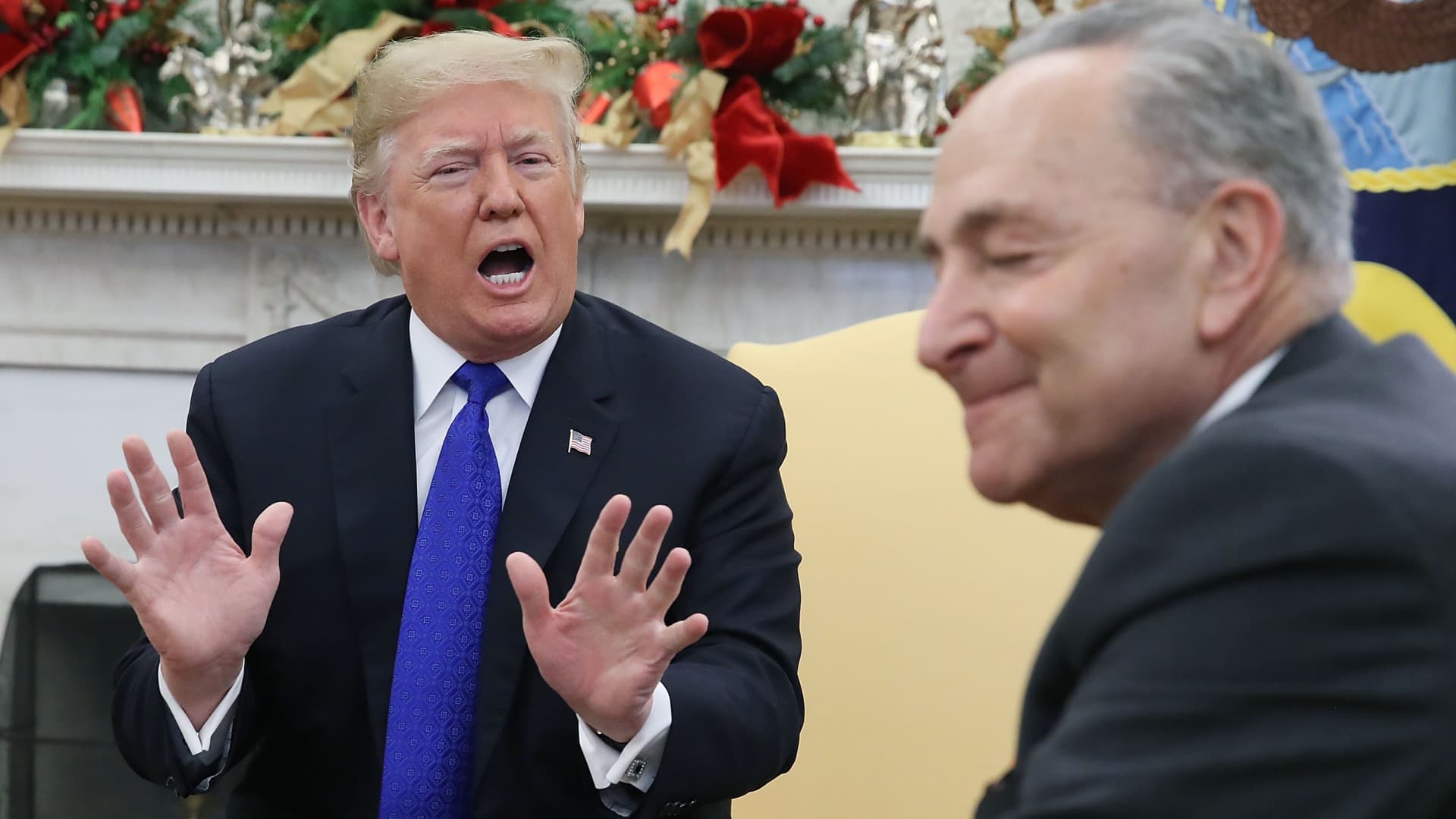 President Donald Trump argues about border security with Senate Minority Leader Chuck Schumer (D-NY) in the Oval Office on December 11, 2018 in Washington, DC.