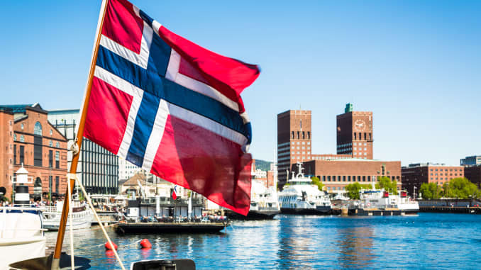Norway raises rates as expected, sees further hike this year