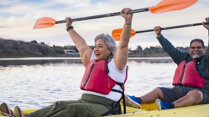 GP: Senior Mexican Couple Kayaking Celebrating