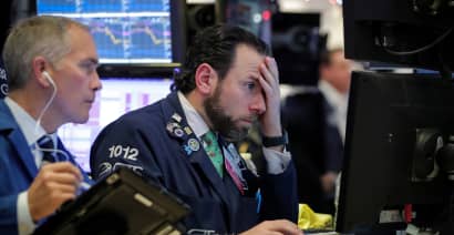 Money managers see profit-taking in Thursday's 'healthy pullback'