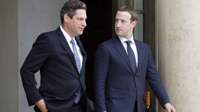 Facebook vice president of global public policy Joel Kaplan and Facebook CEO Mark Zuckerberg leave the Elysee Presidential Palace after a meeting with French President Emmanuel Macron on May 23, 2018 in Paris, France.