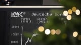 The DAX Index curve is displayed inside the Frankfurt Stock Exchange, operated by Deutsche Boerse AG, on the last day of trading of the year in Frankfurt, Germany, on Friday, Dec. 28, 2018. European shares rallied, while Asian stocks were mixed and U.S. equity futures held steady on Friday as traders struggled to make sense of wild price swings in the final sessions of the year. Photographer: Alex Kraus/Bloomberg via Getty Images