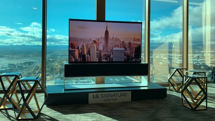 Watch this super thin TV roll up and disappear in seconds