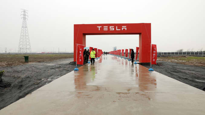 Banners line a road leading to an event at the site of the Tesla manufacturing facility in Shanghai on Jan. 7, 2019.