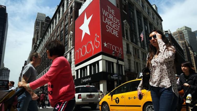 Macy's shares fall after company lowers guidance