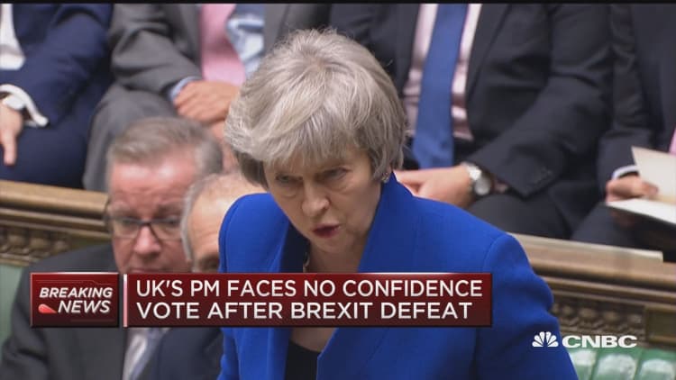 UK Prime Minister Theresa May speaks after surviving no-confidence vote