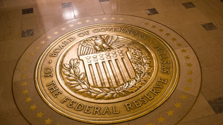 Fed removes 'some further gradual' rate guidance