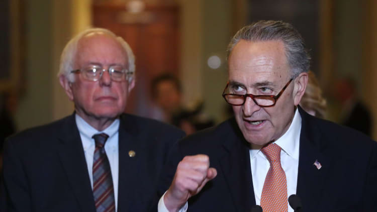 Chuck Schumer, Bernie Sanders call for limits on corporate buybacks