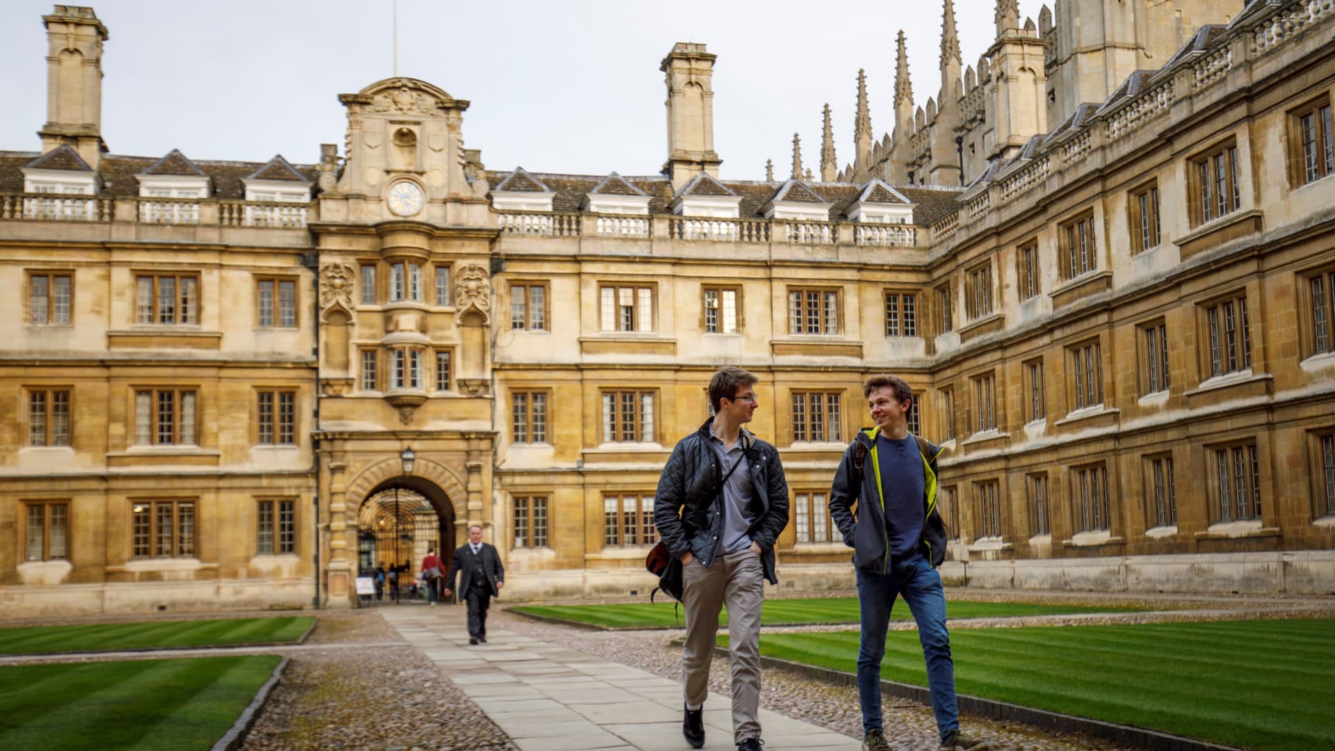 Students walk through Cambridge University in Cambridge, east of England, on March 14, 2018.