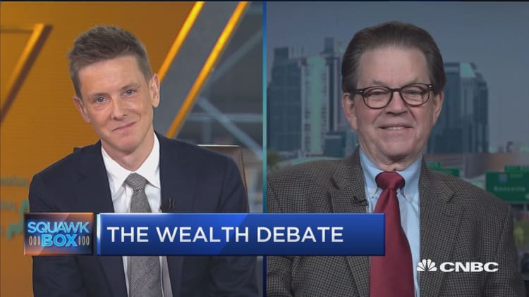 Watch economist Arthur Laffer and Facebook co-founder Chris Hughes debate the 'wealth tax'