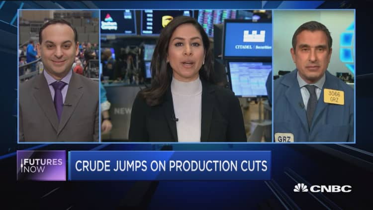 Crude oil jumps on production cuts
