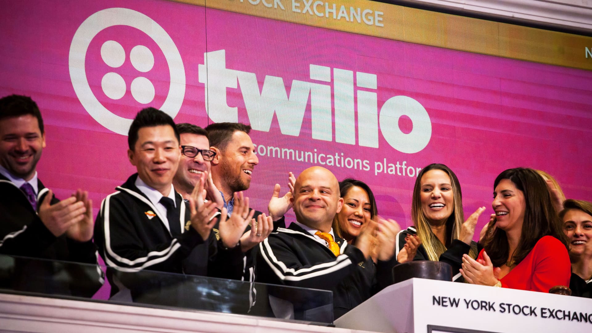 Jeff Lawson, co-founder and chief executive officer of Twilio Inc., center, rings the opening bell on the floor of the New York Stock Exchange in New York, Sept.17, 2018.