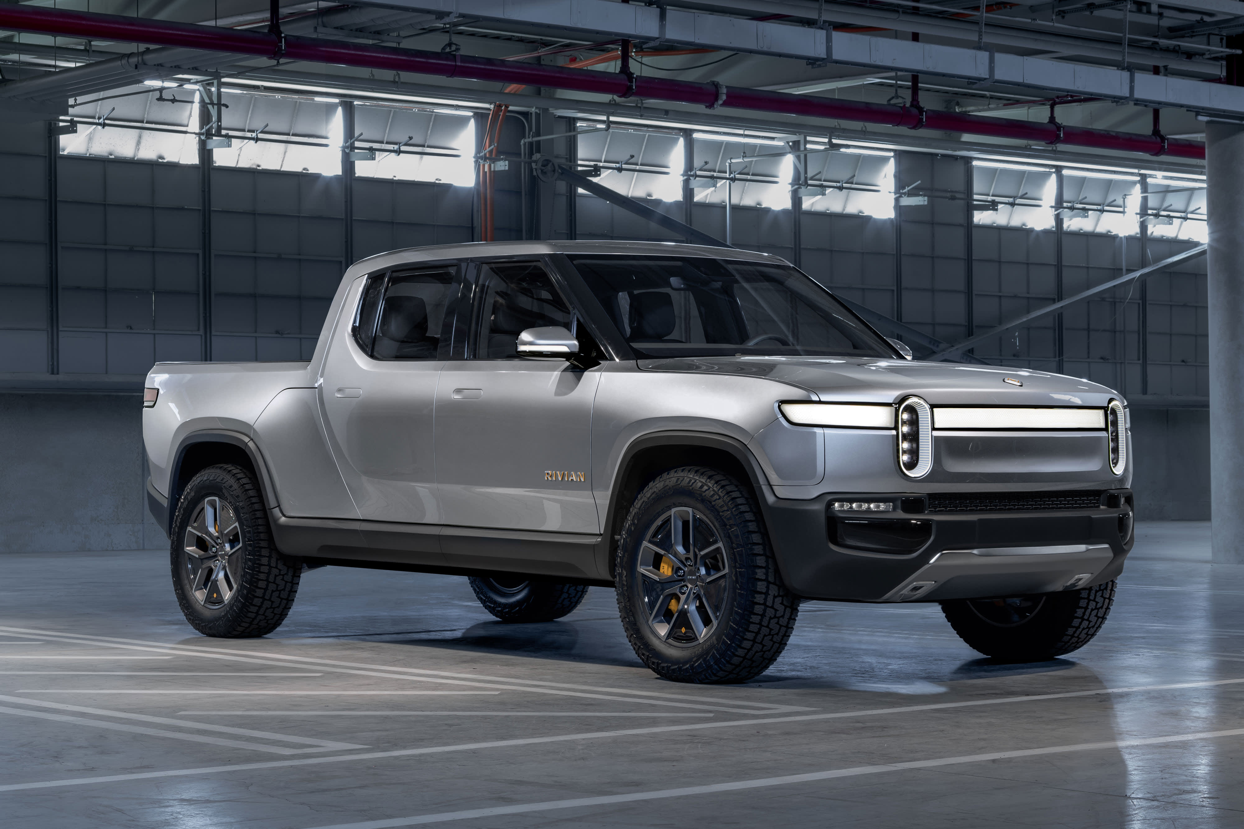 EV start-up Rivian beats Tesla, GM, Ford as first automaker to produce electric pickup