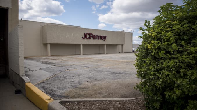 Signage is displayed outside a JC Penney Co. store in Chicago, Illinois.