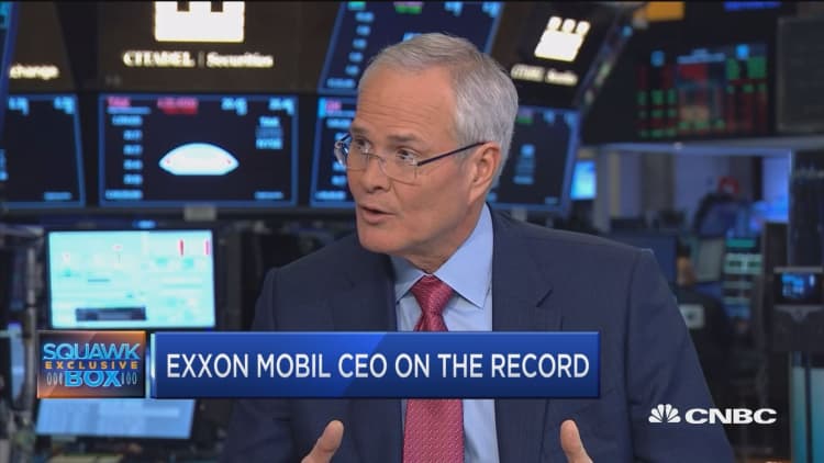 Exxon Mobil CEO Darren Woods explains its plan to increase capital spending
