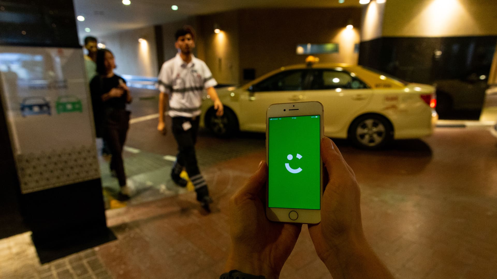 The Careem ride-hailing app is displayed on an iPhone at a shopping mall in Dubai.