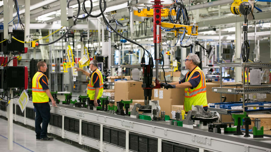 Workers assembling parts of a Volvo AB S60 sedan at the Volvo Cars USA plant in Ridgeville, South Carolina, U.S., on Wednesday, June 20, 2018.