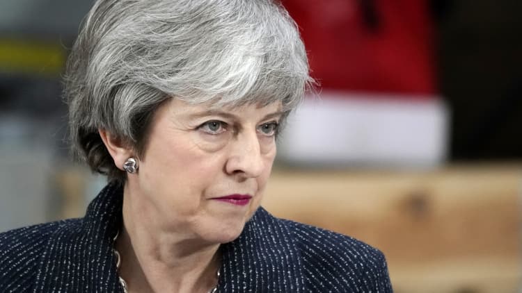 Theresa May offered to resign to encourage UK lawmakers to back her Brexit deal