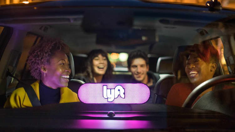Lyft reports earnings beats across the board, stock surges after hours