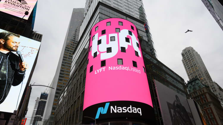 Watch the moment Lyft begins trading on the Nasdaq at $87.24 a share