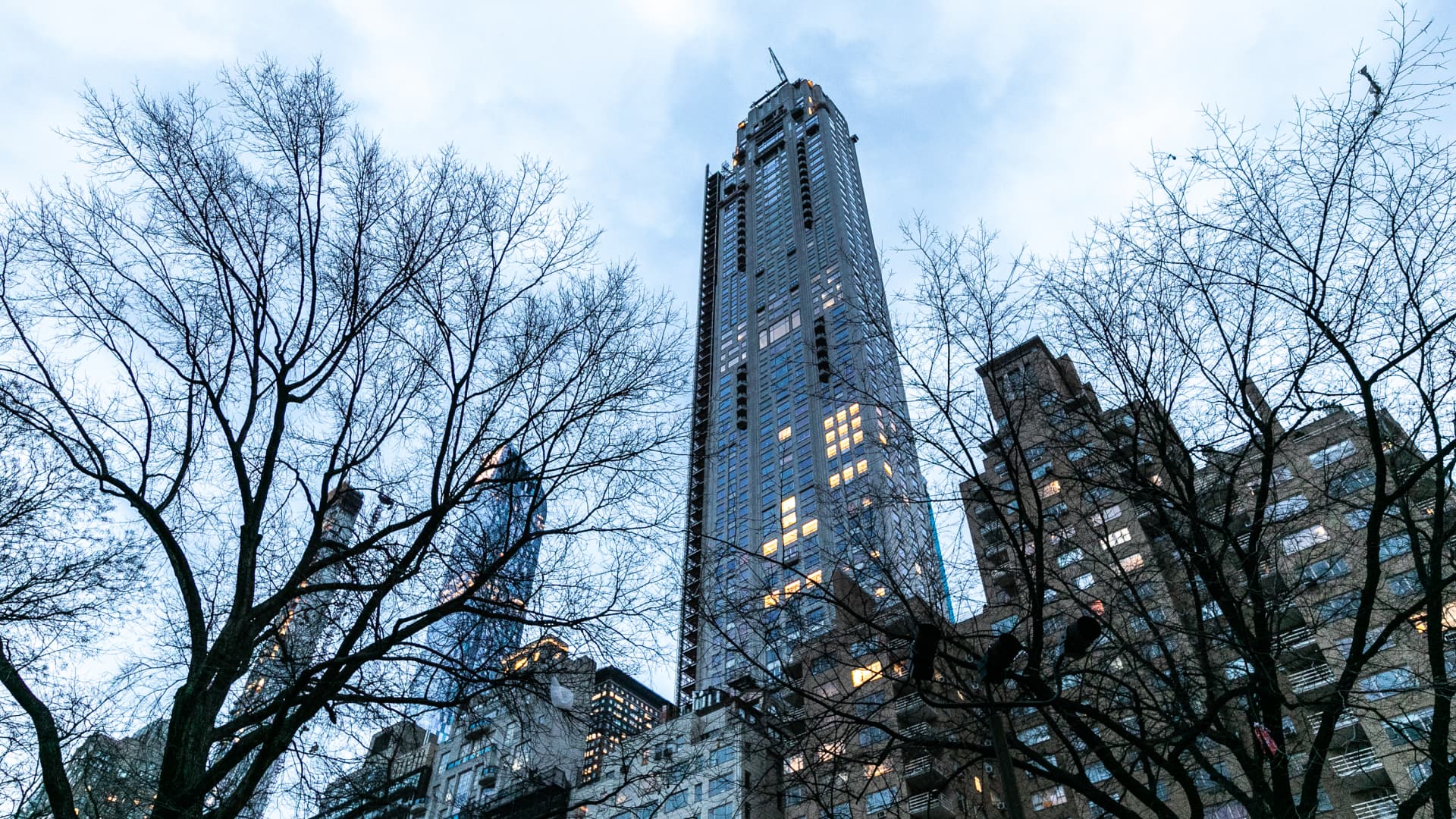 The 220 Central Park South building, center, stands in New York, on Jan. 23, 2019. Just days after buying one of the most expensive residential properties in London, Citadel founder Ken Griffin set a U.S. record with the $238 million penthouse at 220 Central Park South.