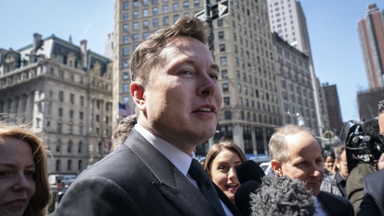 Elon Musk may plan to buy more Tesla shares