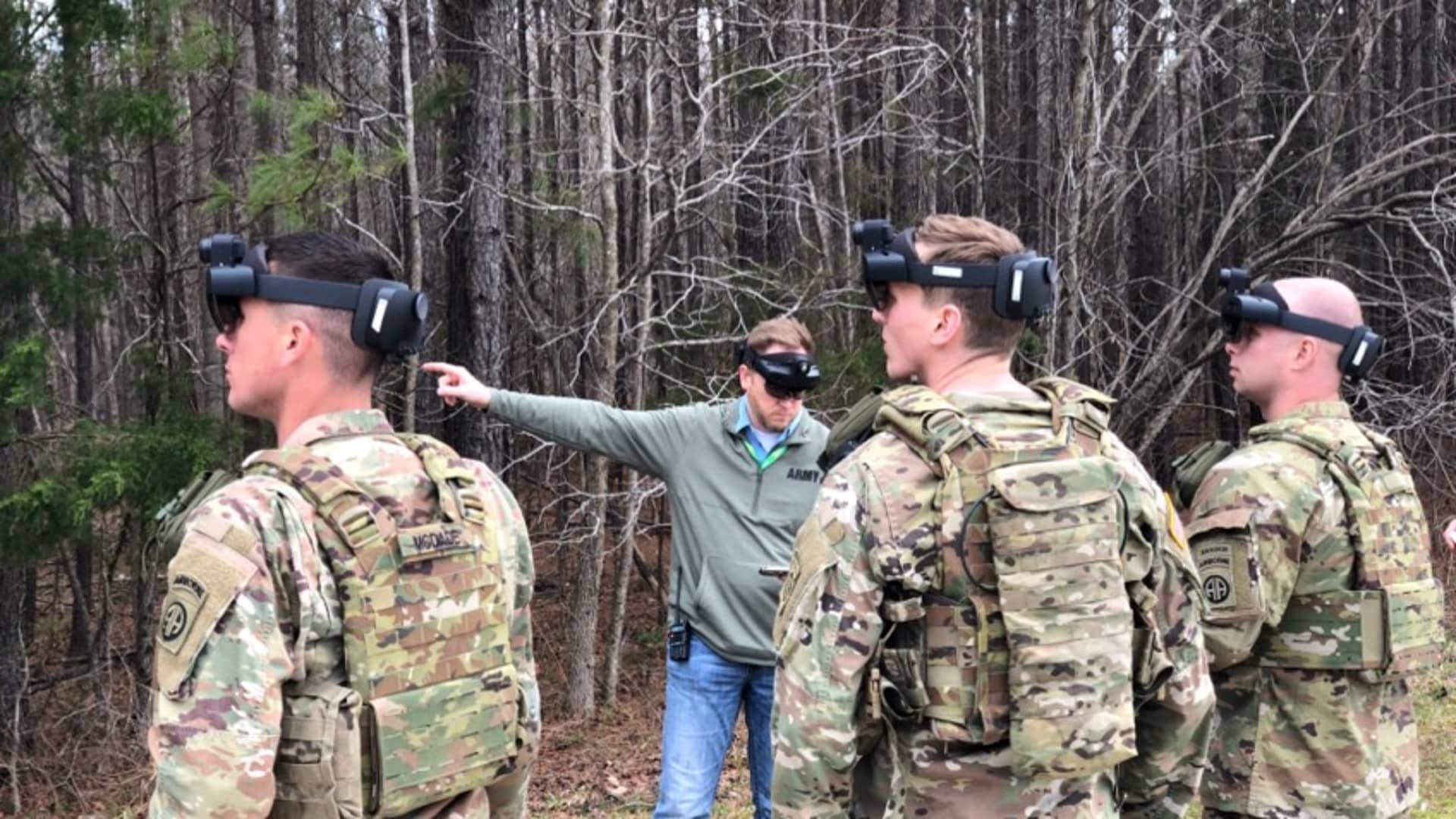 Soldiers wearing the IVAS system, a modified version of the HoloLens 2.