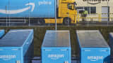 A truck pulling an Amazon Prime branded cargo container waits beside the entrance gate at Amazon.com Inc.'s new fulfillment center in Kolbaskowo, Poland, on Friday, Feb. 16, 2018.