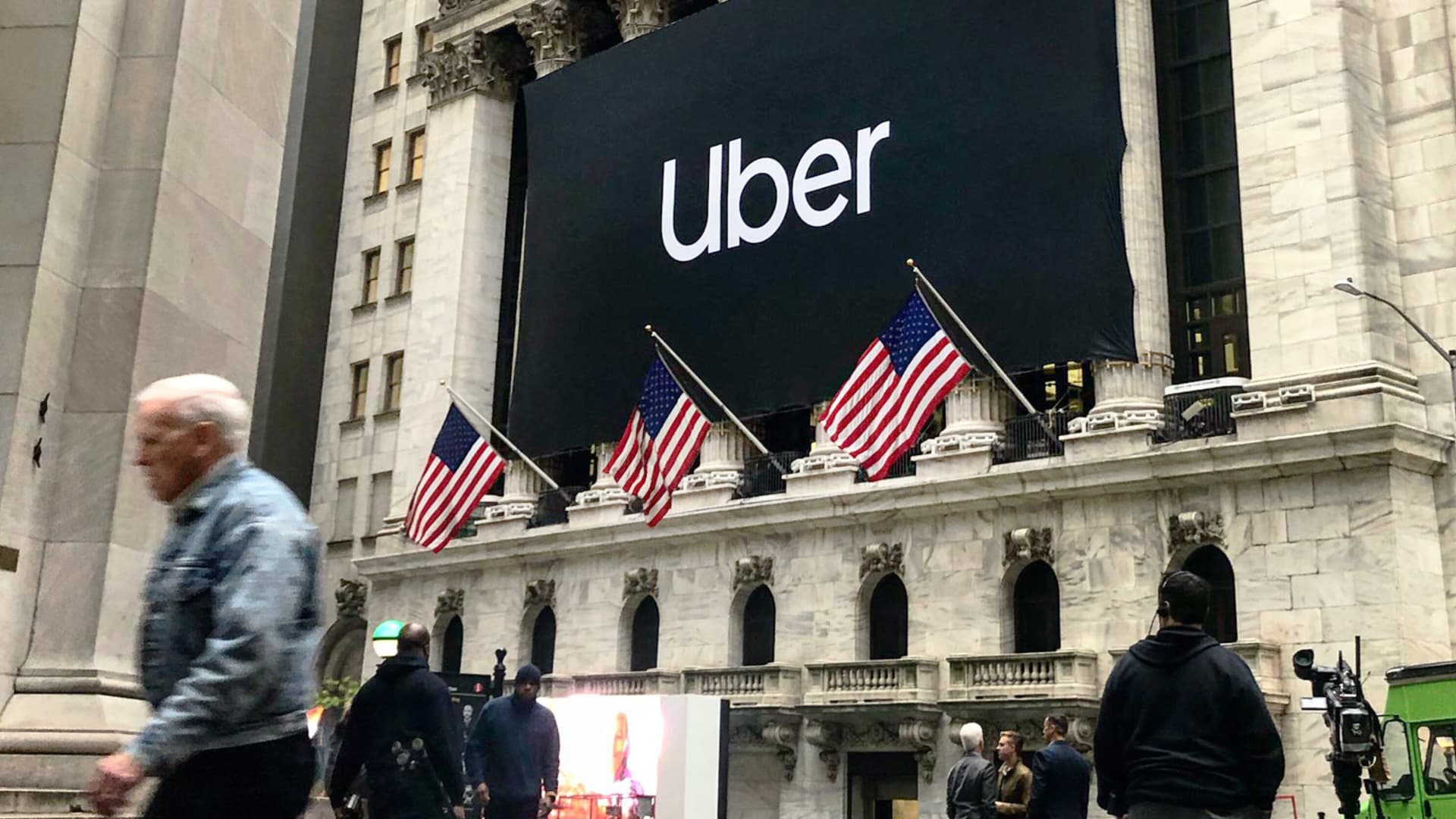 Stocks making the biggest moves midday: Uber, Pinterest, Caterpillar and more
