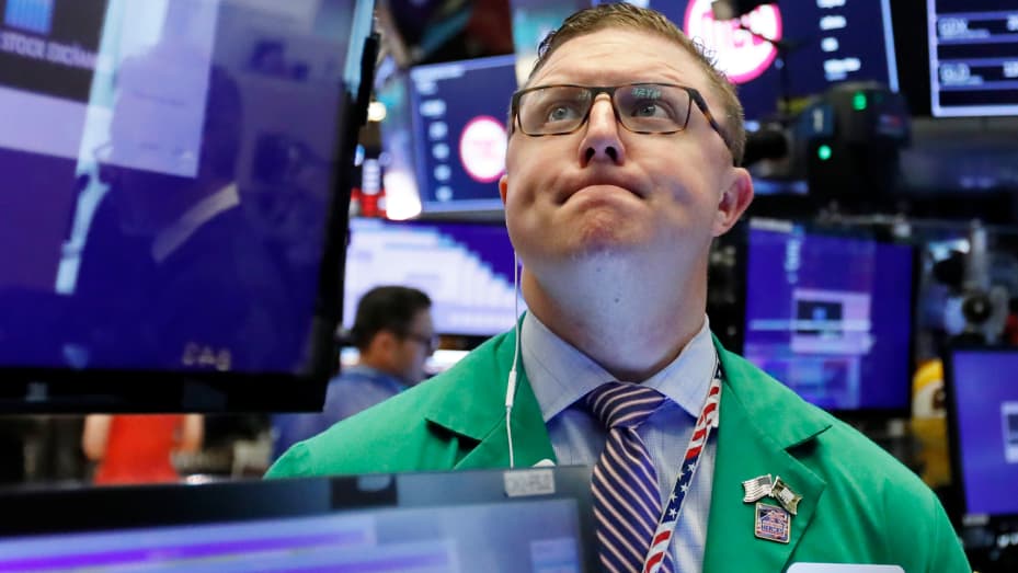 Trader Ryan Falvey works on the floor of the New York Stock Exchange.